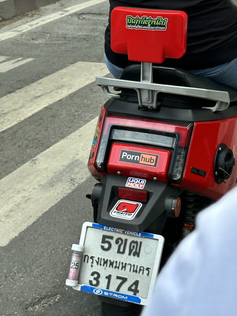 Pornhub logo sticker on the back of a scooter