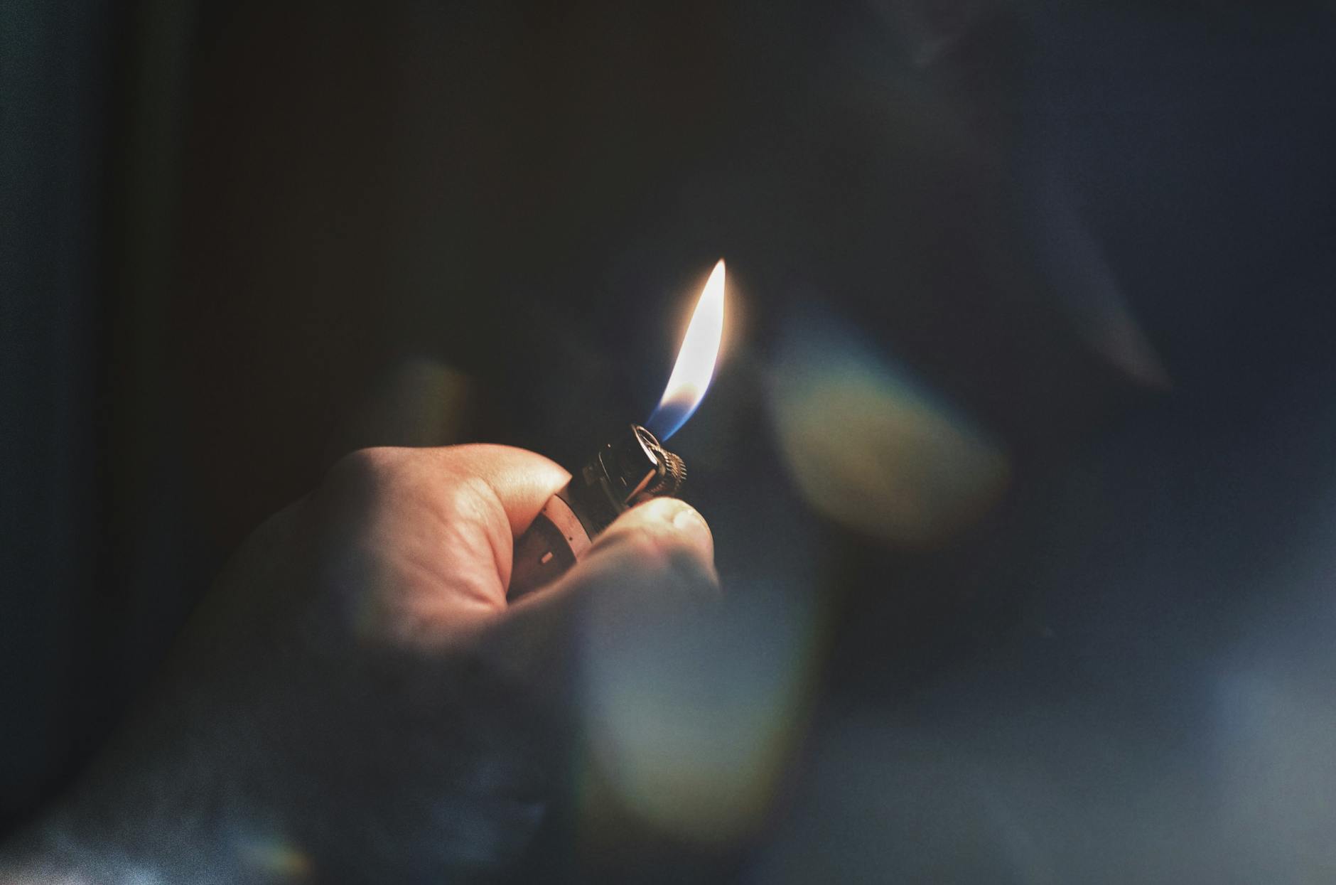 person holding lighter