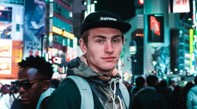 photo of man wearing cap