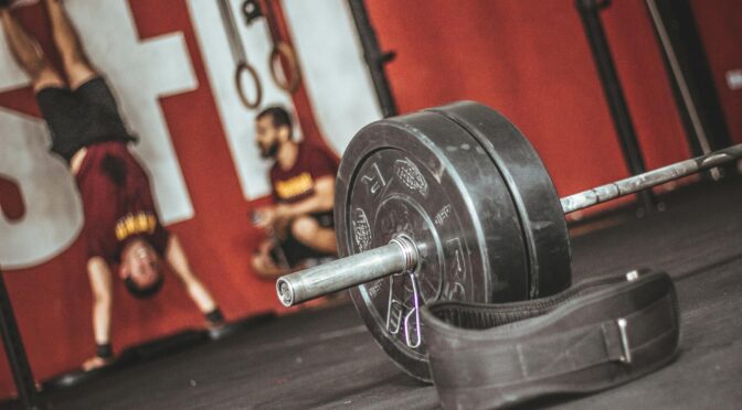 focus photography of barbell
