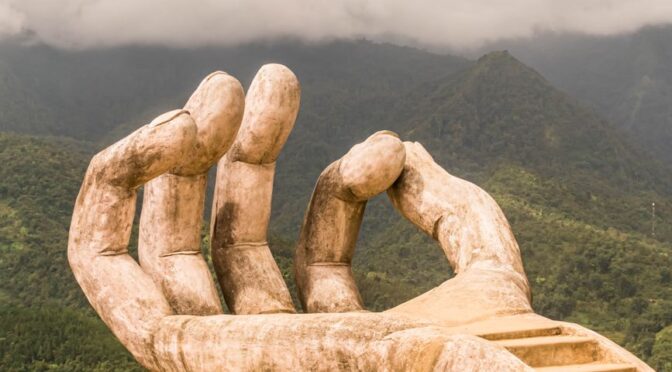 large stone hand viewpoint in moana sapa in vietnam